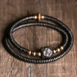 bracelet en bois d Ébène Sculpté et Cuivre Vieilli