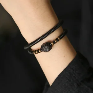 bracelet en bois d Ébène et cuivre vieilli